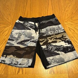 Reebok training shorts.